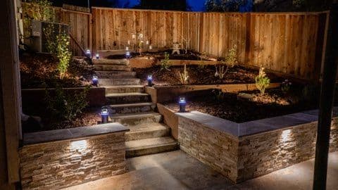 Elevate Your Outdoor Space with Stonework and Soft Lighting